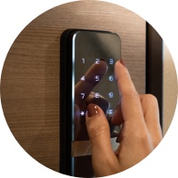Finger touching keypad