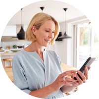 Woman smiling at phone