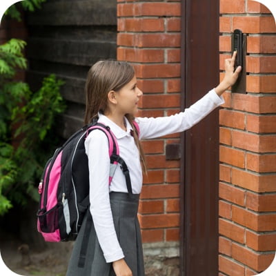 Girl ringing doorbell