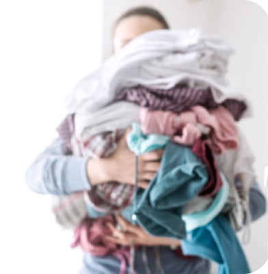 Person holding laundry